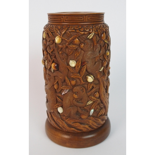 71 - A Japanese carved wood spill vase