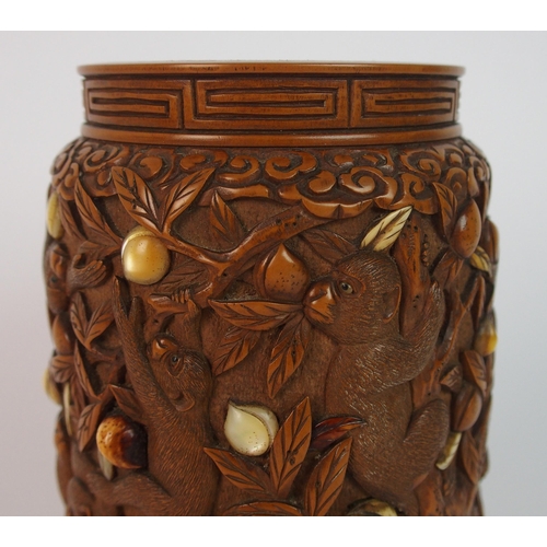 71 - A Japanese carved wood spill vase