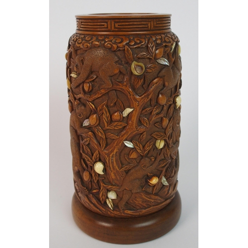 71 - A Japanese carved wood spill vase