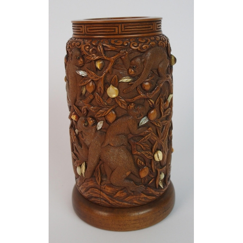 71 - A Japanese carved wood spill vase