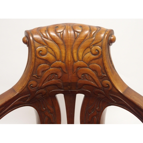 785 - A mahogany ship's Captain's swivel open armchair