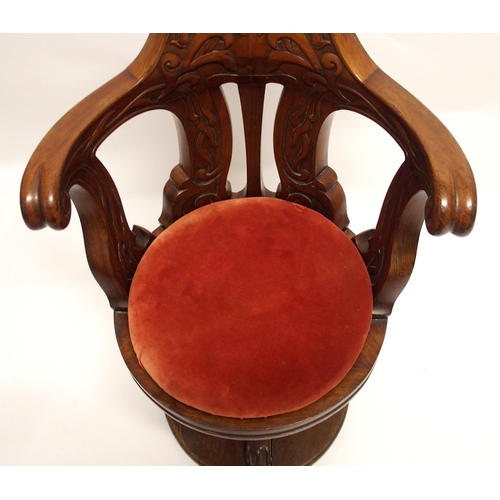 785 - A mahogany ship's Captain's swivel open armchair