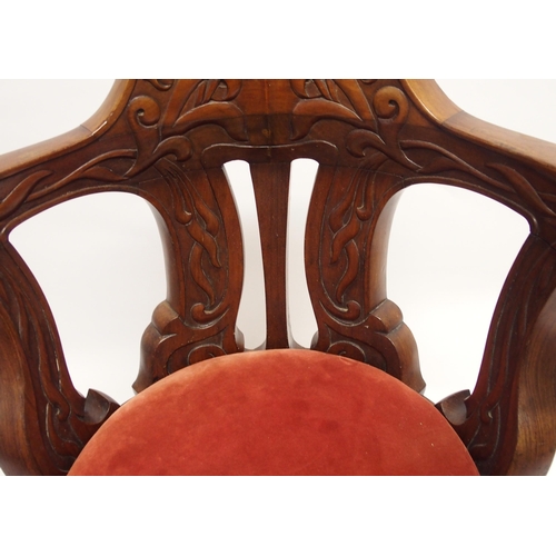 785 - A mahogany ship's Captain's swivel open armchair