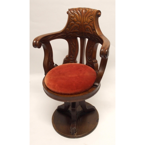 785 - A mahogany ship's Captain's swivel open armchair