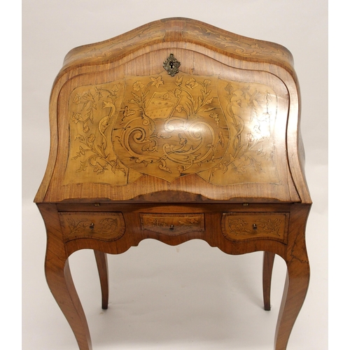 790 - A Louis XV walnut marquetry bombe writing desk