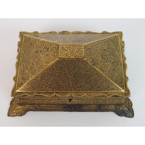 82 - An Indian gilt damascened iron casket