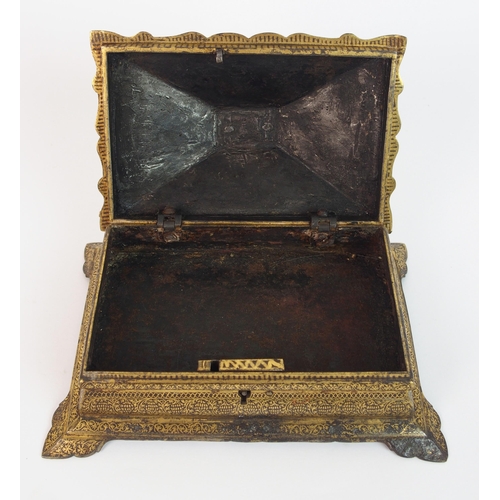 82 - An Indian gilt damascened iron casket