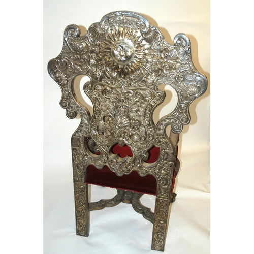 868 - An impressive Spanish Colonial silver repousse mounted throne armchair