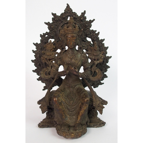 88 - A Sino Tibetan bronze model of a Buddhistic figure