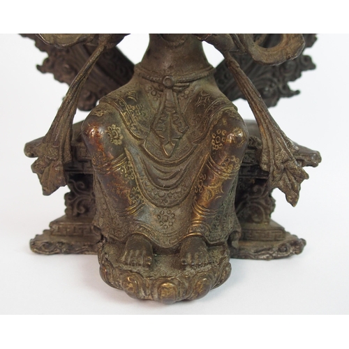 88 - A Sino Tibetan bronze model of a Buddhistic figure