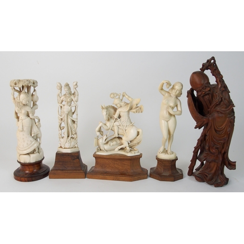 90 - An Anglo-Indian ivory carving of a naked woman