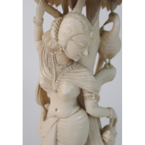 90 - An Anglo-Indian ivory carving of a naked woman