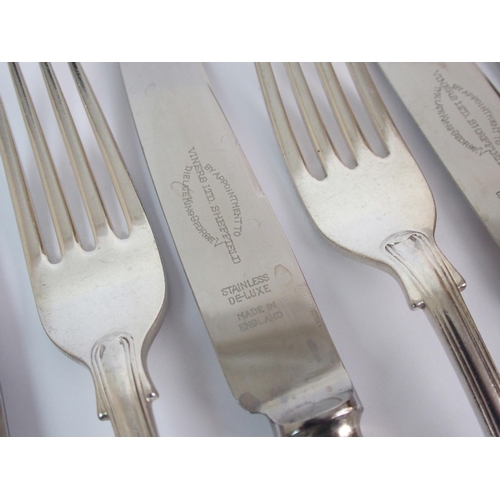 159 - A matched twelve setting suite of cutlery