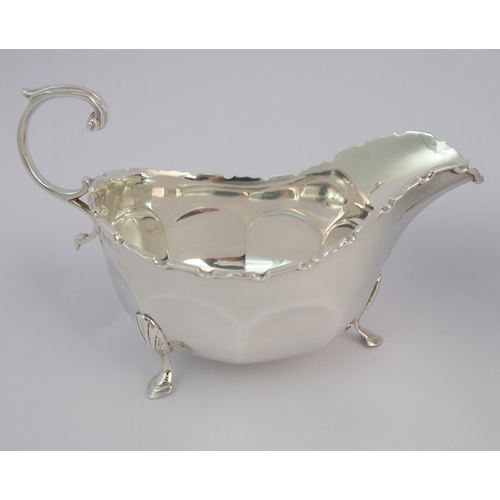 160 - A pair of silver sauce boats