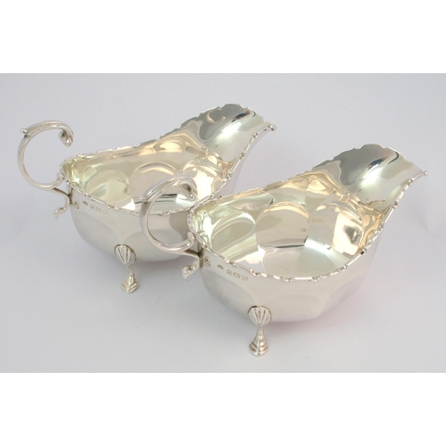 160 - A pair of silver sauce boats