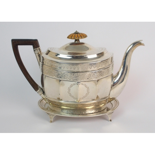 162 - A three piece silver tea service with teapot stand