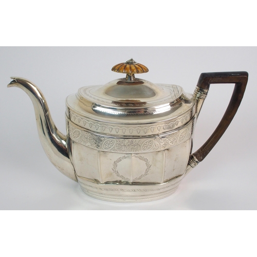 162 - A three piece silver tea service with teapot stand