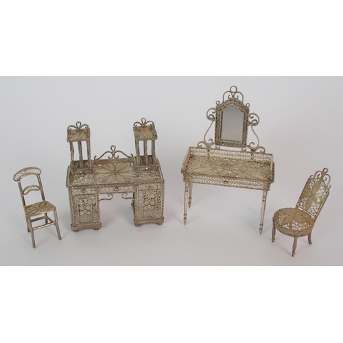 172 - A collection of Eastern filigree white metal furniture