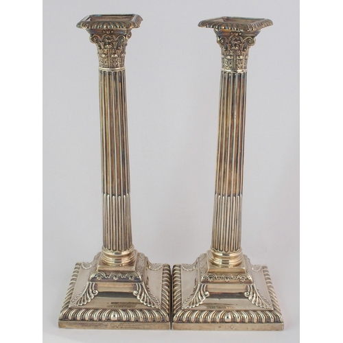 188 - A pair of silver candlesticks