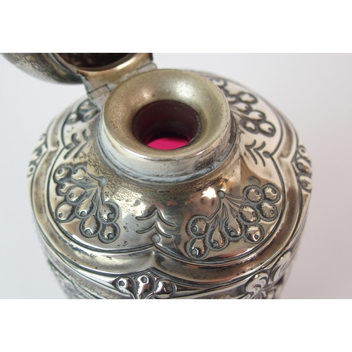 193 - An Edwardian silver mounted cranberry glass scent bottle