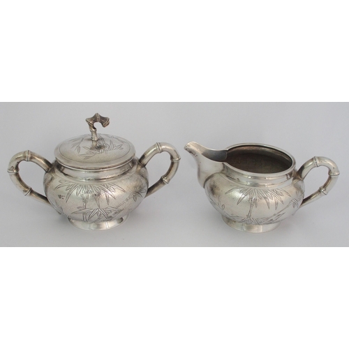 21 - A Chinese sterling silver four-piece tea service