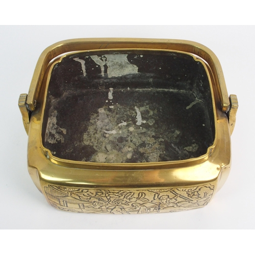 26 - A Chinese brass hand warmer