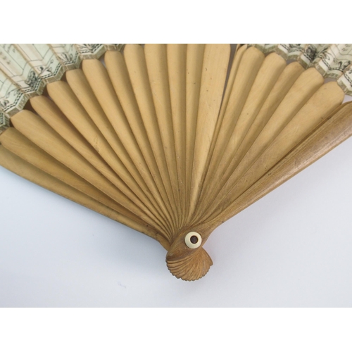 281 - A wood and paper fan