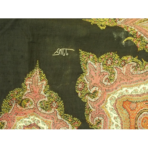 294 - A Kashmir woolwork shawl