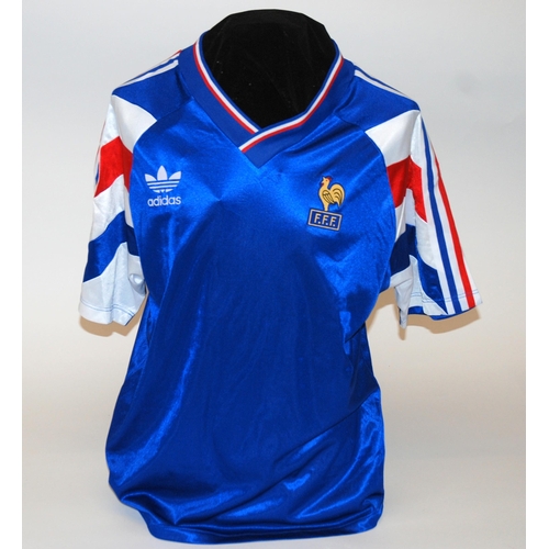 342 - A blue France International short-sleeved shirt