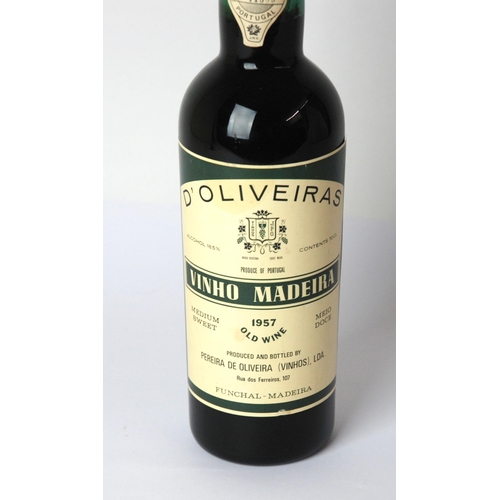 386A - A bottle of D'Oliveiras Vinho Maderia  1957