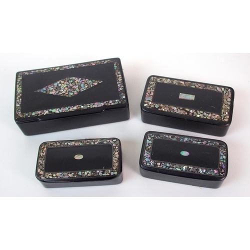 405 - A group of Victorian black lacquered mother of pearl and metal inlaid boxes