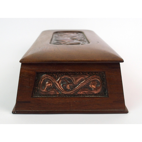 413 - A Celtic revival copper and wood casket in the style of Alexander Ritchie