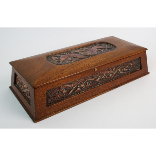 413 - A Celtic revival copper and wood casket in the style of Alexander Ritchie