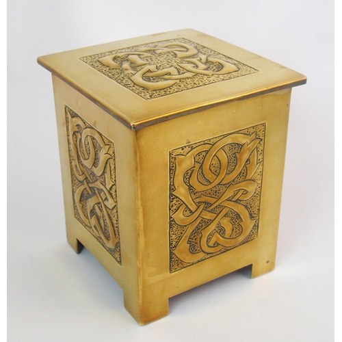 414 - A Celtic revival brass tea caddy in the style of Alexander Ritchie