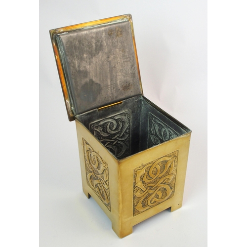 414 - A Celtic revival brass tea caddy in the style of Alexander Ritchie