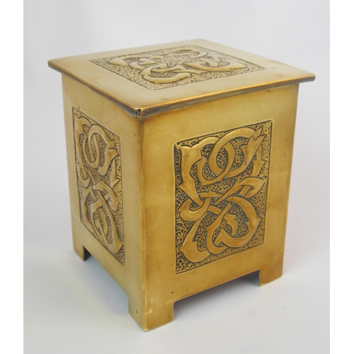 414 - A Celtic revival brass tea caddy in the style of Alexander Ritchie