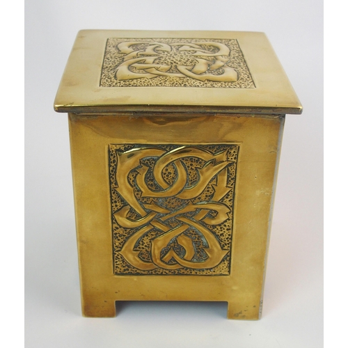 414 - A Celtic revival brass tea caddy in the style of Alexander Ritchie