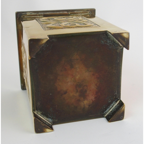 414 - A Celtic revival brass tea caddy in the style of Alexander Ritchie