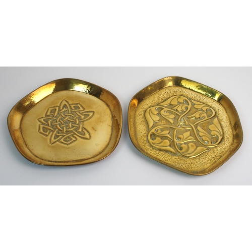 416 - Two Celtic revival brass trays in the style of Alexander Ritchie