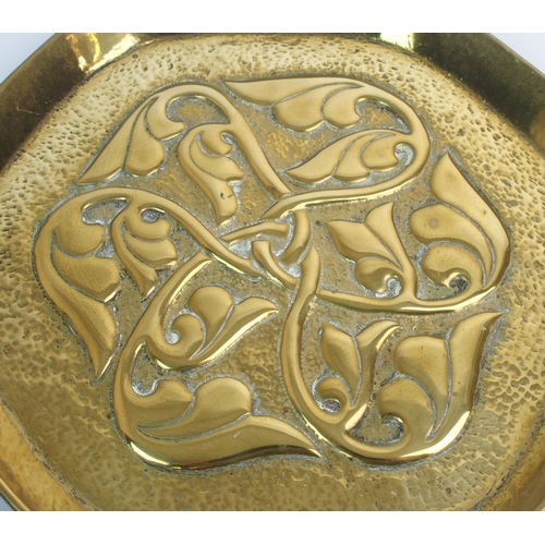 416 - Two Celtic revival brass trays in the style of Alexander Ritchie