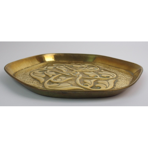 416 - Two Celtic revival brass trays in the style of Alexander Ritchie