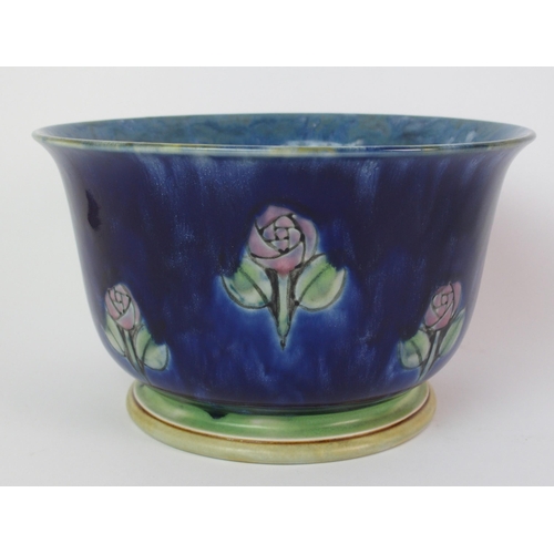 423 - A Royal Doulton stoneware jardiniere