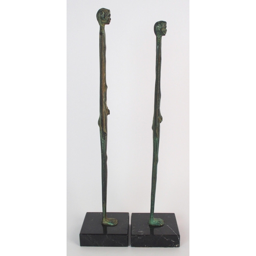 439 - A pair of bronze figural sculptures