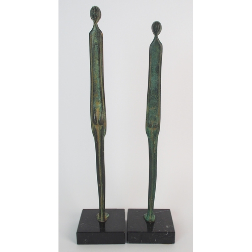 439 - A pair of bronze figural sculptures