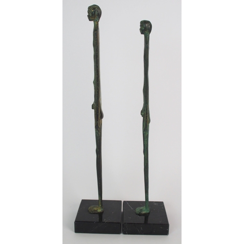 439 - A pair of bronze figural sculptures