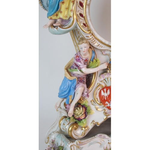 448 - A German porcelain clockcase and stand