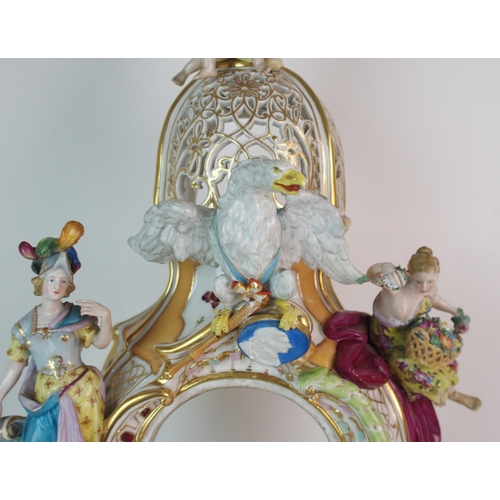 448 - A German porcelain clockcase and stand