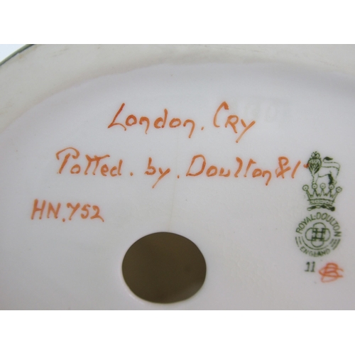 449 - A Royal Doulton figure of London Cry HN. 752