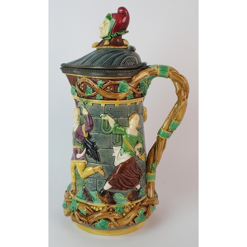 452 - A Minton Majolica 'Court Jester Tower' jug