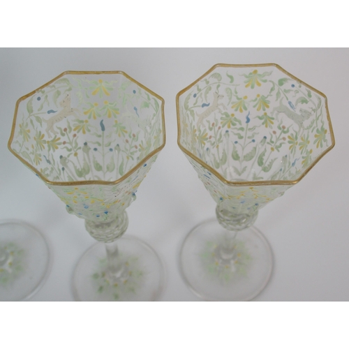 454 - A set of six facon de venise octagonal wine glasses